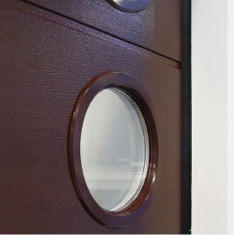 Alutech round window with colour matching frame